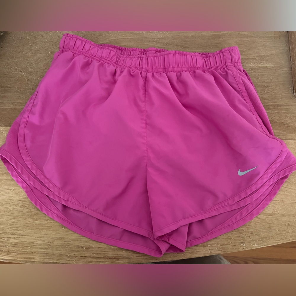 Pink Nike running shorts